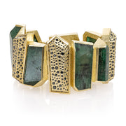 Todd Reed bracelet with Emeralds(~263.08ct), black brilliant cut diamonds(~6.35ct), 18k yellow gold, and 14k white gold.